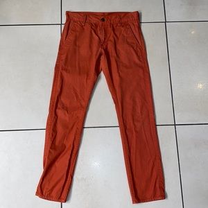 Levi’s men’s 511 skinny jeans in Red/Salmon color
